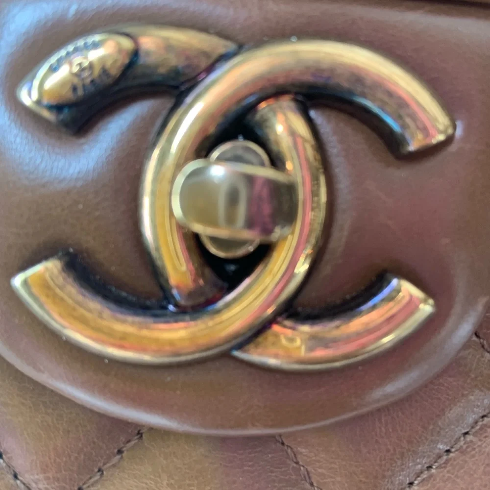 Classic brown lamb‎ skin Chanel handbag with shoulder strap